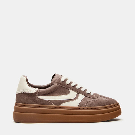 Brown and white sneaker with a thick sole on a white background