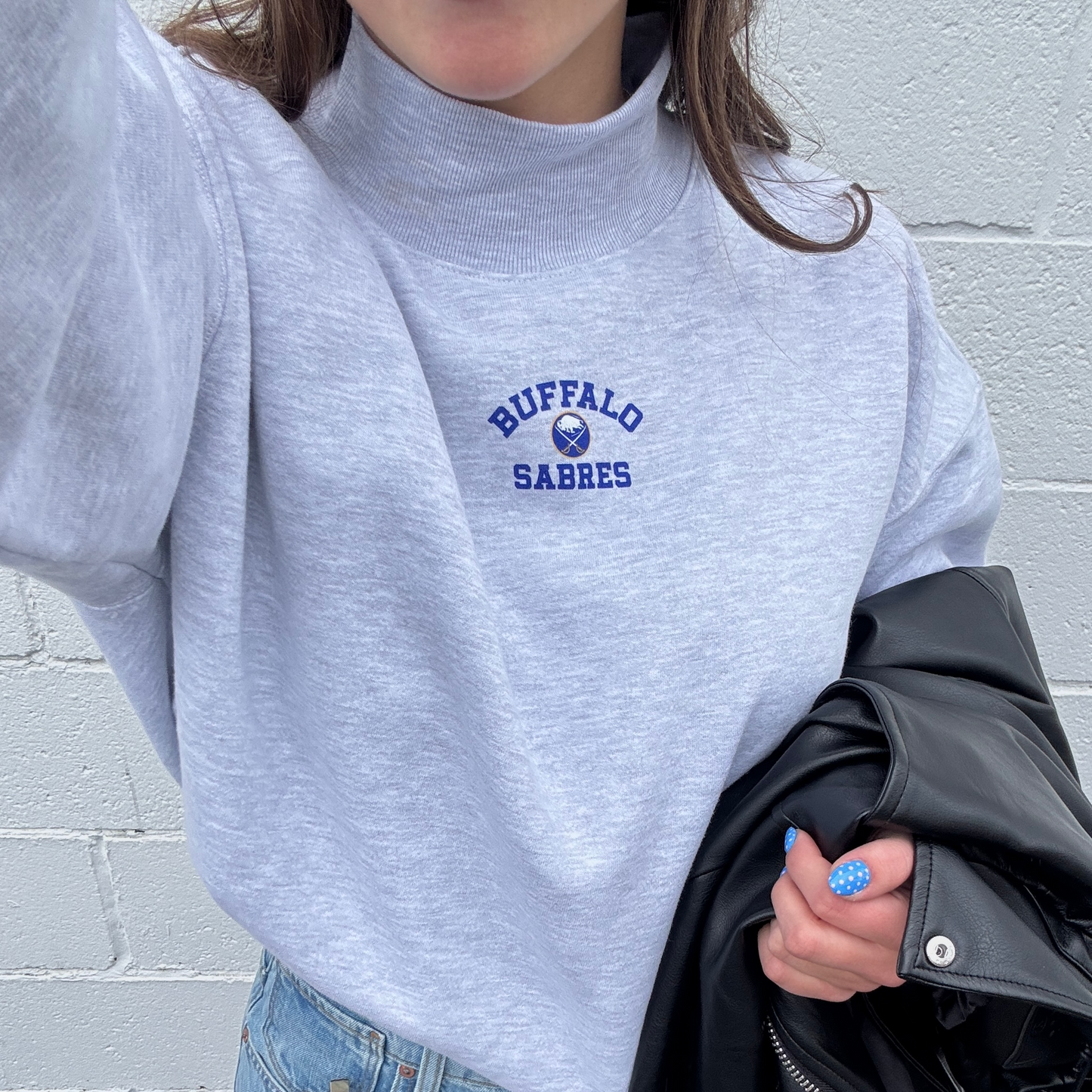 Sabres Spirited Arch Mock Neck